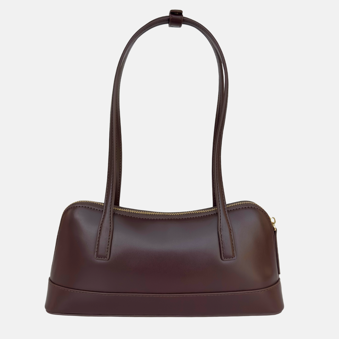 brown handbag east west style shoulder bag with long straps and minimal hardware