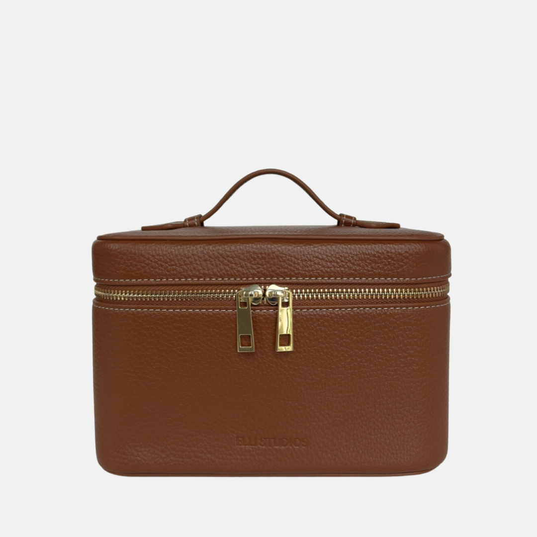 Warm brown mini vanity case with structured design for makeup and travel essentials