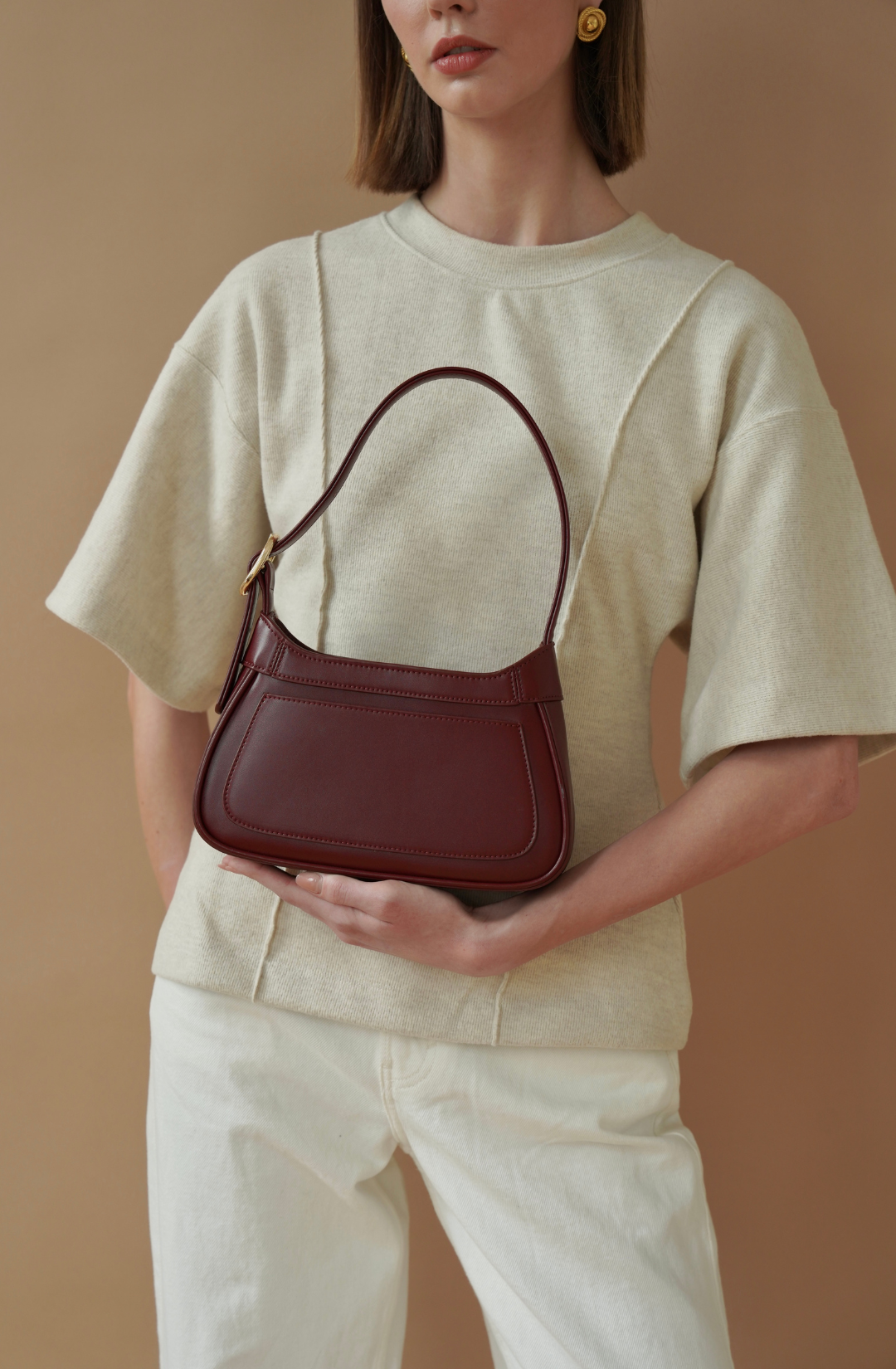 minimalist cherry red shoulder bag with clean lines, perfect for everyday styling