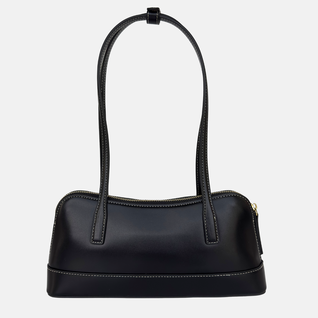 black handbag east west style shoulder bag with long straps and minimal hardware