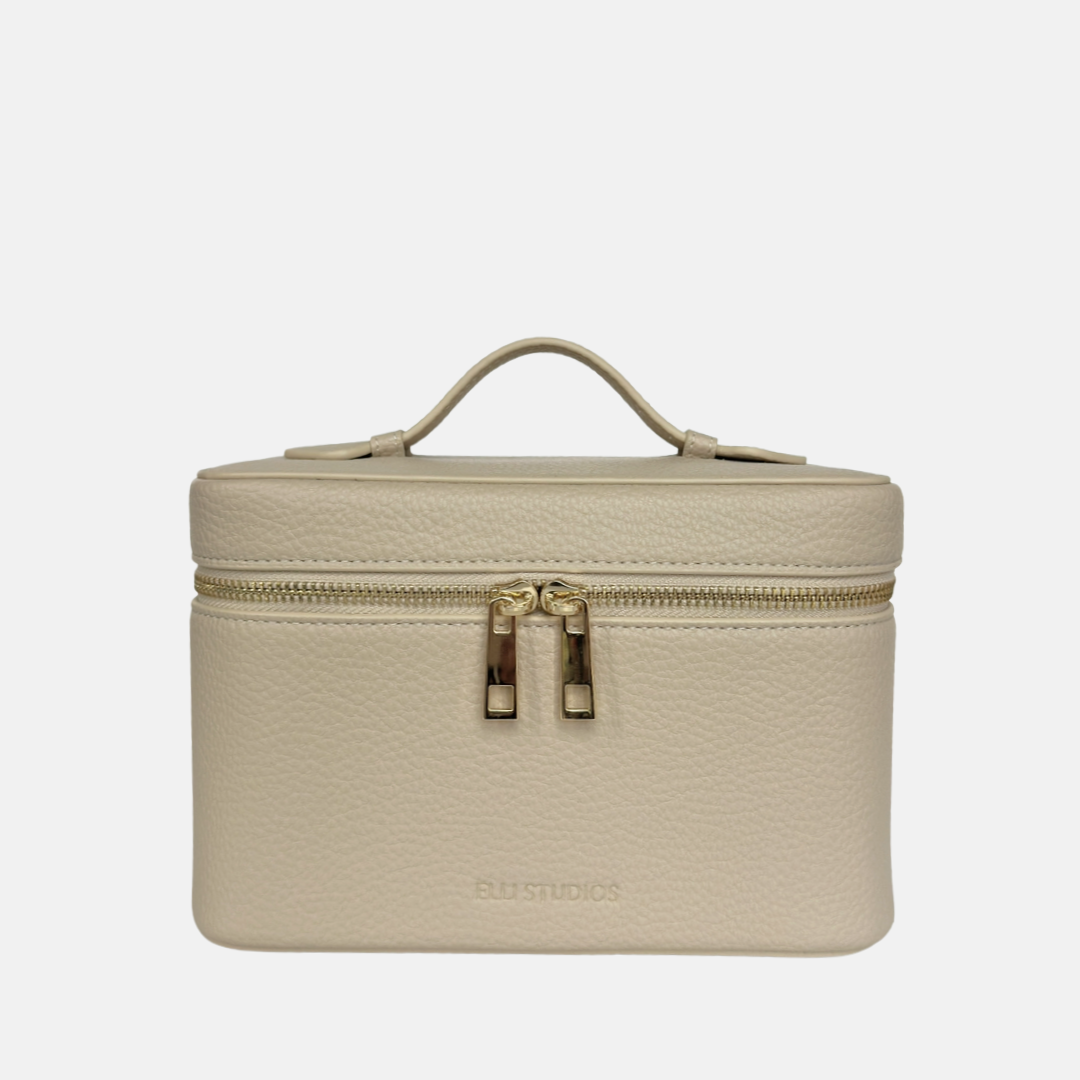Soft cream mini vanity case with structured shape for makeup, travel, and daily essentials