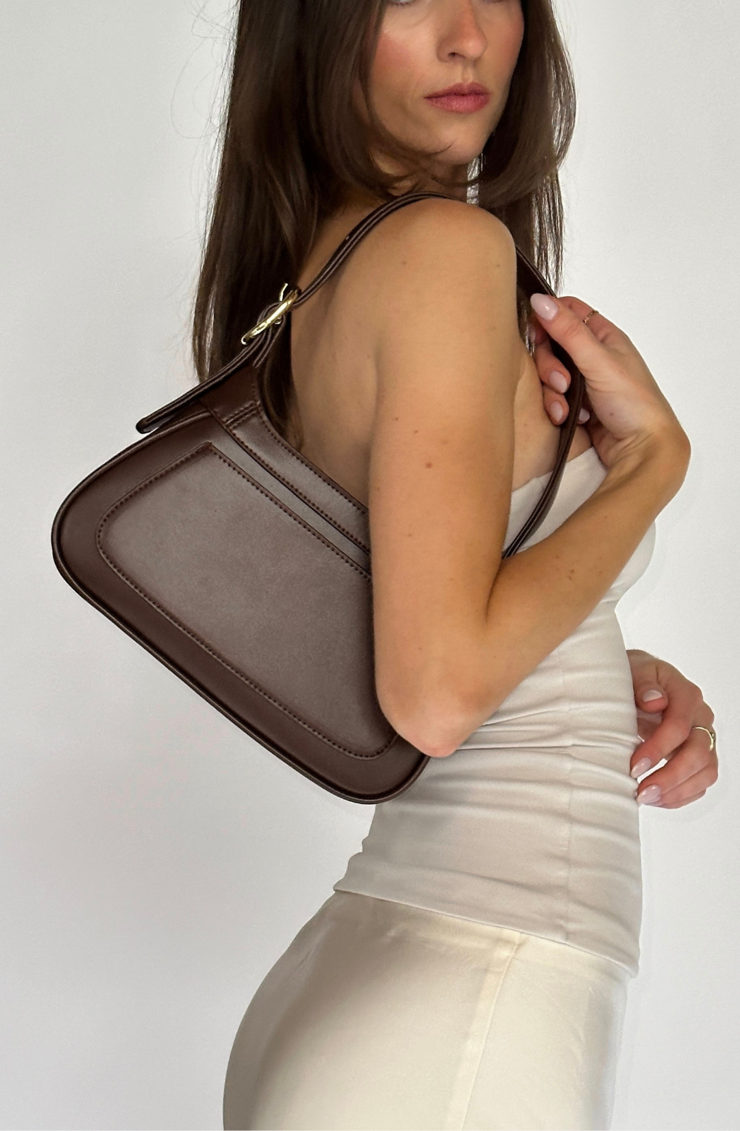 sleek brown shoulder bag designed for everyday use and evening outings