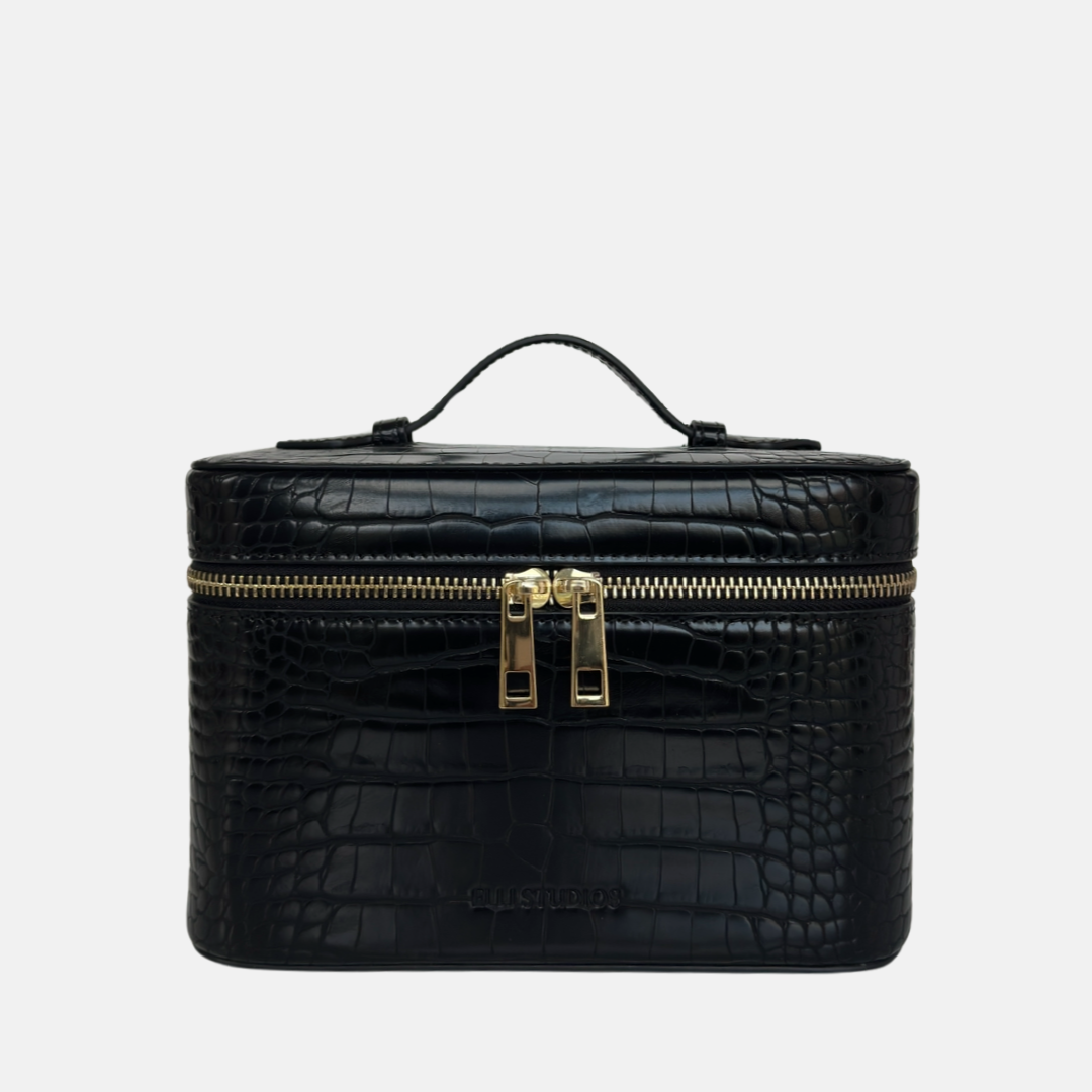 Mini black croc vanity case with structured shape for makeup and everyday essentials