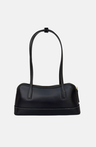 black handbag east west style shoulder bag with long straps and minimal hardware 